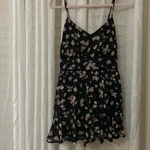 NWT Trixxi black floral romper. Size S. From Francesca’s.